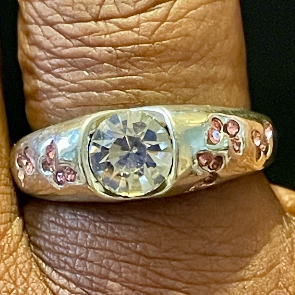 Clear Crystal Solitaire Ring with Pink Gemstone Butterflies on the side. Size 9